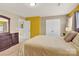 Comfortable bedroom featuring carpet flooring, closet doors, and natural light at 12217 Dearview Ln, Charlotte, NC 28269
