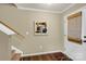 Welcoming entryway with hardwood floors, stairs, and stylish decor creates a great first impression at 12217 Dearview Ln, Charlotte, NC 28269