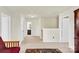 Upstairs hallway offering neutral carpet, paint, and views into other rooms at 12217 Dearview Ln, Charlotte, NC 28269