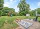 Spacious backyard features a playset, shed, and patio area with outdoor seating at 1227 Seneca Pl, Charlotte, NC 28210