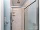 Modern shower stall with glass door and sleek fixtures, offering a spa-like experience at 1227 Seneca Pl, Charlotte, NC 28210