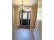 Foyer with black front door and decorative glass at 12304 Sandringham Pl, Charlotte, NC 28262
