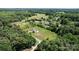 Overview of a neighborhood with spacious lots, mature trees, and well-kept homes at 125 Carter Ln, Statesville, NC 28625