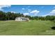 Home and expansive yard offers plenty of space for outdoor activities at 125 Carter Ln, Statesville, NC 28625