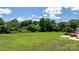 View of the expansive backyard and wooded perimeter at 125 Carter Ln, Statesville, NC 28625