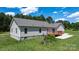 Expansive backyard showcasing the house's exterior and landscaping at 125 Carter Ln, Statesville, NC 28625