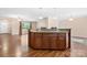 Bright and airy kitchen and living room area features an island with lots of storage space at 125 Carter Ln, Statesville, NC 28625