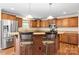 Kitchen with granite countertops, stainless steel appliances, and eat-in island with barstool seating at 125 Carter Ln, Statesville, NC 28625