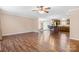 Open living area with hardwood floors, ceiling fan and natural light at 125 Carter Ln, Statesville, NC 28625
