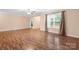 Spacious living room featuring hardwood floors and natural light from large window at 125 Carter Ln, Statesville, NC 28625