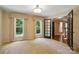Bright bedroom with large windows and light-colored walls at 1295 Patterson St, China Grove, NC 28023