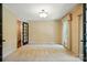Comfortable bedroom with French door, window and light-colored walls at 1295 Patterson St, China Grove, NC 28023