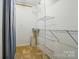 Walk-in closet with shelving and a curtain rod offers ample storage space at 1295 Patterson St, China Grove, NC 28023