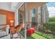 Comfortable balcony with outdoor seating area and views of the building exterior at 1315 East Blvd # 410, Charlotte, NC 28203