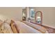 Bedroom boasting wood flooring, natural lighting, and a full length mirror at 1315 East Blvd # 410, Charlotte, NC 28203
