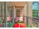 Enclosed balcony featuring outdoor seating and a view of the cityscape at 1315 East Blvd # 410, Charlotte, NC 28203