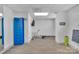 Gym with a rowing machine, exercise mat, mounted TV, and large windows offering ample natural light at 1315 East Blvd # 410, Charlotte, NC 28203
