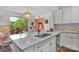 Bright kitchen with granite counters, stainless appliances and balcony access at 1315 East Blvd # 410, Charlotte, NC 28203