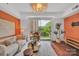 Bright living room with modern furnishings and balcony access at 1315 East Blvd # 410, Charlotte, NC 28203