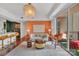 Open-concept living area with designer lighting and balcony at 1315 East Blvd # 410, Charlotte, NC 28203