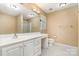 Bathroom features a large vanity, a huge mirror, and a toilet space at 1318 Candlewood Dr, Gastonia, NC 28052