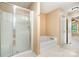 Bathroom with a shower and a soaking tub at 1318 Candlewood Dr, Gastonia, NC 28052