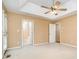 Large main bedroom with bright lighting and two door entryways at 1318 Candlewood Dr, Gastonia, NC 28052