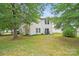 Spacious backyard with green lawn and patio area, perfect for outdoor enjoyment at 1332 Waterlily Ln, Charlotte, NC 28262
