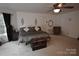 Spacious primary bedroom features neutral colors and decor at 1332 Waterlily Ln, Charlotte, NC 28262