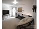 Large bonus room is ideal for entertaining or a home office at 1332 Waterlily Ln, Charlotte, NC 28262