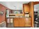 Open concept kitchen with eat in bar and stainless steel appliances at 1332 Waterlily Ln, Charlotte, NC 28262