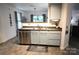 Kitchen features stainless steel dishwasher and a double sink at 1332 Waterlily Ln, Charlotte, NC 28262