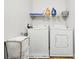 Functional laundry room featuring a side-by-side washer and dryer at 1332 Waterlily Ln, Charlotte, NC 28262
