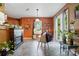 Bright sitting area with a fireplace, comfortable chairs, and decor, creating an inviting and cozy atmosphere at 1332 Waterlily Ln, Charlotte, NC 28262