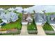A stunning aerial view of beautiful homes with lush lawns and private boat docks at 136 Preston Rd, Mooresville, NC 28117