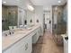 Elegant bathroom with double sinks, a glass-enclosed shower, and a soaking tub at 136 Preston Rd, Mooresville, NC 28117