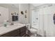 Bright and airy bathroom featuring a shower/tub combo, a modern vanity, and decorative wall art at 136 Preston Rd, Mooresville, NC 28117