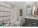 Clean bathroom with a shower-tub combo, a modern vanity, and neutral-toned walls for a relaxing experience at 136 Preston Rd, Mooresville, NC 28117