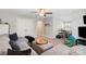 Cozy living room featuring a sectional sofa, a wall mounted tv, and a comfortable spot for relaxation and entertainment at 136 Preston Rd, Mooresville, NC 28117