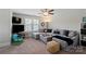 Inviting living room with a comfortable sectional sofa, flat screen tv, and a cozy atmosphere for relaxation and entertainment at 136 Preston Rd, Mooresville, NC 28117