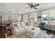 Bright living room with access to the water, featuring neutral colors and stylish furnishings at 136 Preston Rd, Mooresville, NC 28117