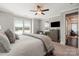 Relaxing main bedroom with water views, complemented by a ceiling fan and neutral decor at 136 Preston Rd, Mooresville, NC 28117