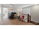 Bright office space with a large desk, modern computer setup, and a window letting in natural light at 136 Preston Rd, Mooresville, NC 28117