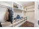 Spacious walk-in closet features a variety of shelving, hanging racks, and overhead storage at 13612 Singleleaf Ln, Charlotte, NC 28278