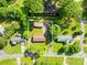 Aerial view shows property lines of a 0.44 acre lot with mature tree coverage at 1408 Delview Rd, Cherryville, NC 28021