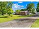 Brick home with well-manicured lawn and beautiful landscaping at 1408 Delview Rd, Cherryville, NC 28021