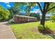 Brick home with well-manicured lawn and beautiful landscaping at 1408 Delview Rd, Cherryville, NC 28021