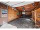 Spacious garage with unfinished walls, concrete floor, and garage door at 1408 Delview Rd, Cherryville, NC 28021