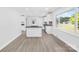 Bright, updated kitchen with modern finishes, featuring an island, stainless appliances, and ample natural light at 1408 Delview Rd, Cherryville, NC 28021