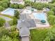 Aerial view of the community pool featuring lap lanes, areas, and clubhouse at 14822 Rocky Top Dr, Huntersville, NC 28078